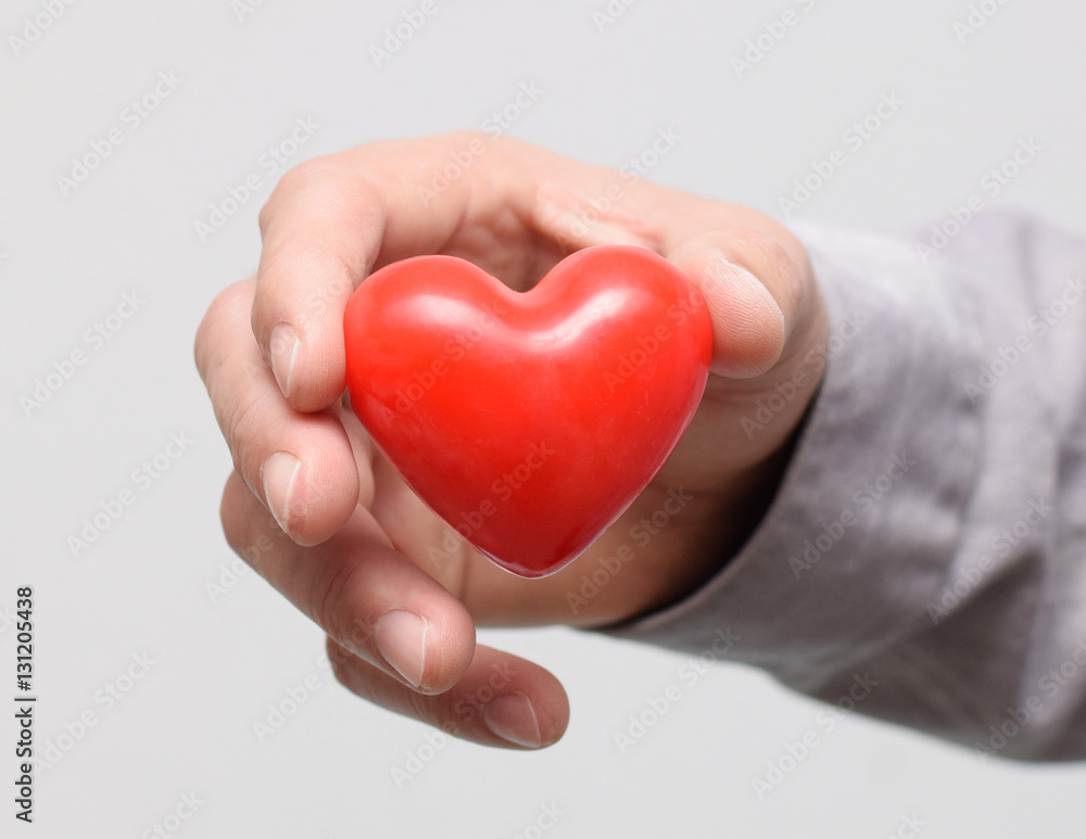 Fototapeta premium Red heart in hand