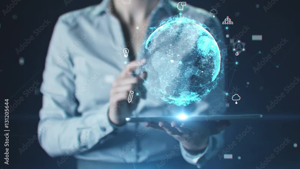 Closeup of businesswoman holding digital tablet with projection of rotating globe illuminated with blue light. Concept of global business