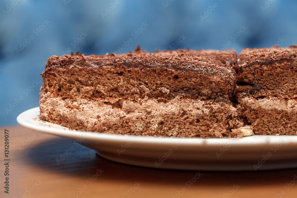 Slices of chocolate cake with cream closeup Slices of chocolate cake with cream closeup