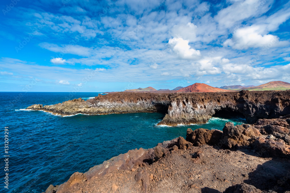 Rocky coastline of Los Hervideros, a local landmark on Lanzarote, Canary Islands, Spain.