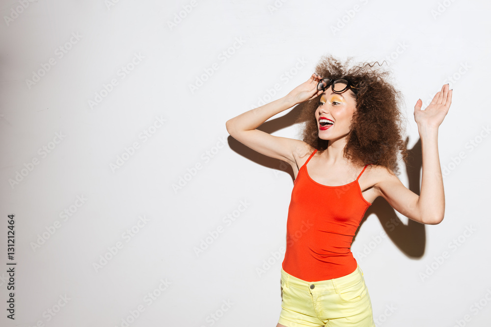 Unusual model waving to the side Unusual model waving to the side