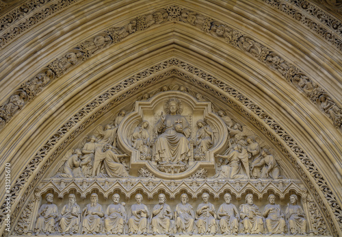 Detail of old church facade. Architectural detail with Jesus Christ