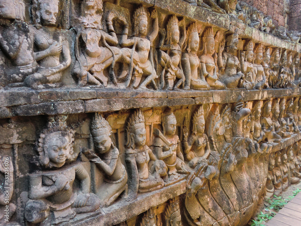 Ancient Cambodian Angkor stone carvings of citizens Ancient Cambodian Angkor stone carvings of citizens