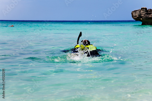Man snorkels out from Smith Cove, Grand Cayman