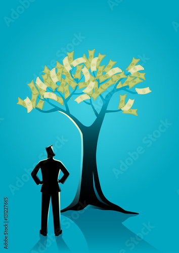 Businessman looking at money tree