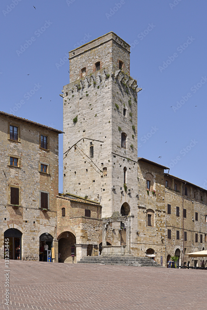 Square Cistema at San Gimignano is a walled medieval hill town in the province of Siena, Tuscany, north-central Italy