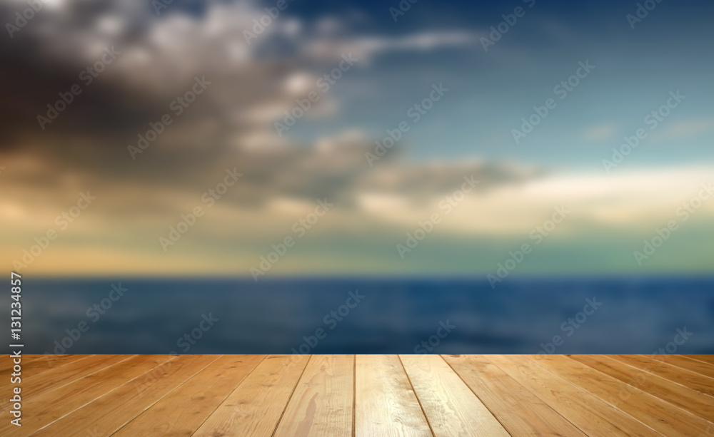 Blurred sea background wooden desk Blurred sea background wooden desk