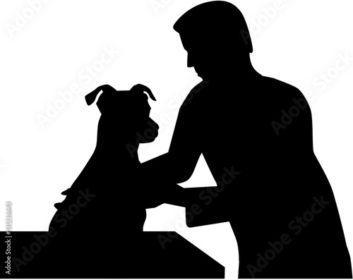 Veterinarian with dog