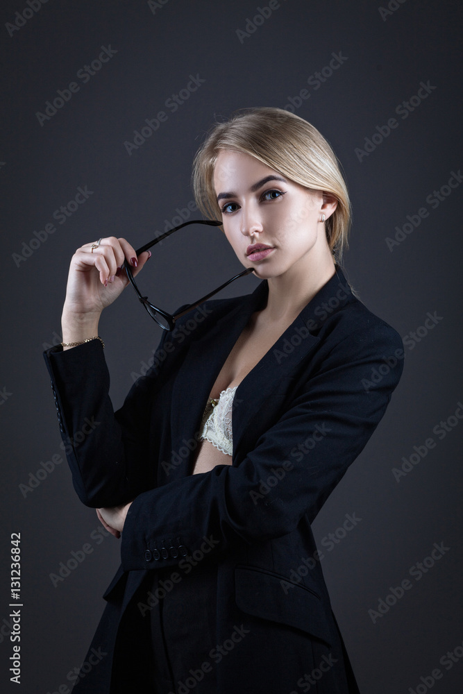 Secretary wearing glasses and a jacket Secretary wearing glasses and a jacket