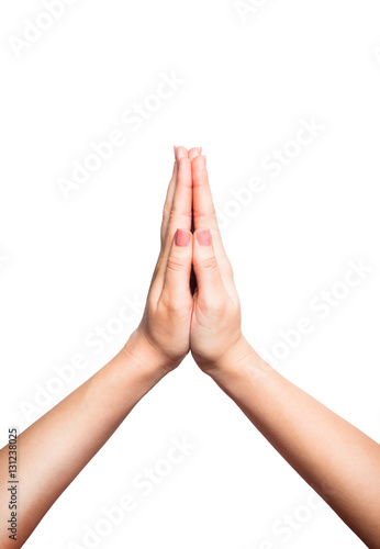 Fotografie woman folds hands for prayer or plea, white background