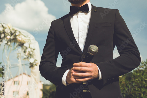 Foto toastmaster at a wedding. mc.