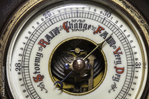 Quadro su tela Fair weather forecast by antique weather barometer
