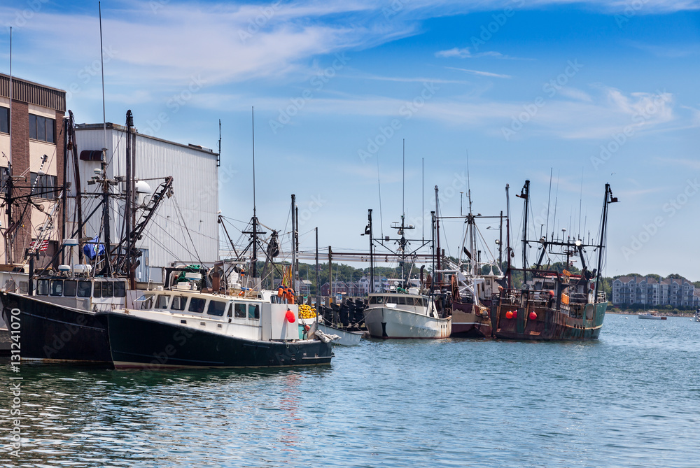Fishing boats docked for ice and fuel at the Portand Fishing Pier