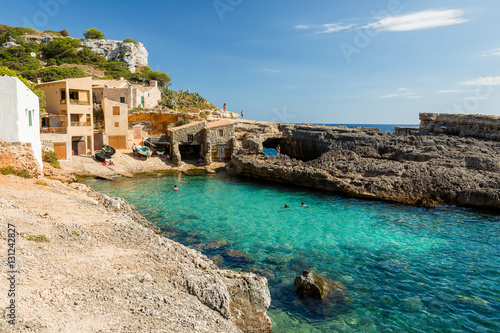 Cala s'Almonia, beach with small fishermen houses. Mallorca. Spain.