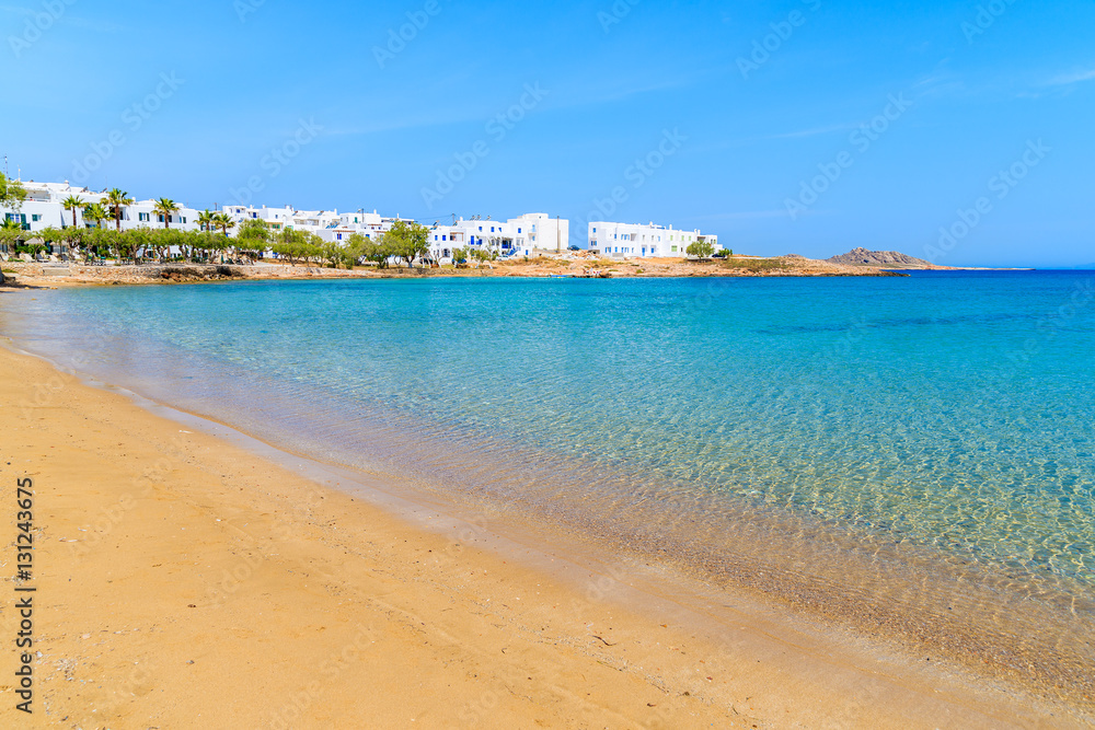 Crystal clear turquoise sea water of a beach in Naoussa village, Paros island, Cyclades, Greece