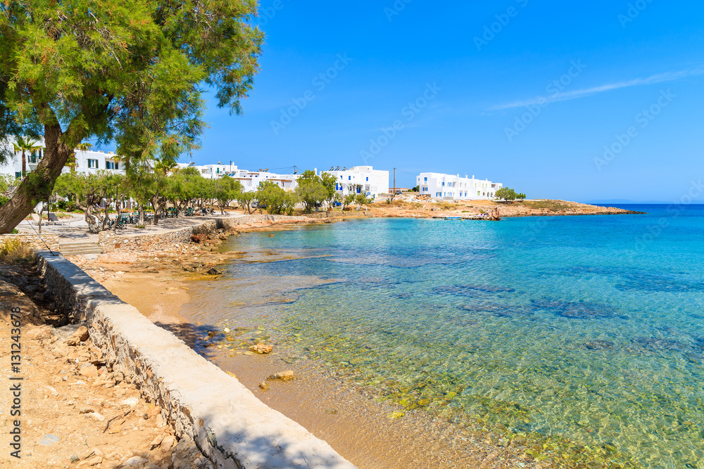 Crystal clear turquoise sea water of a beach in Naoussa village, Paros island, Cyclades, Greece