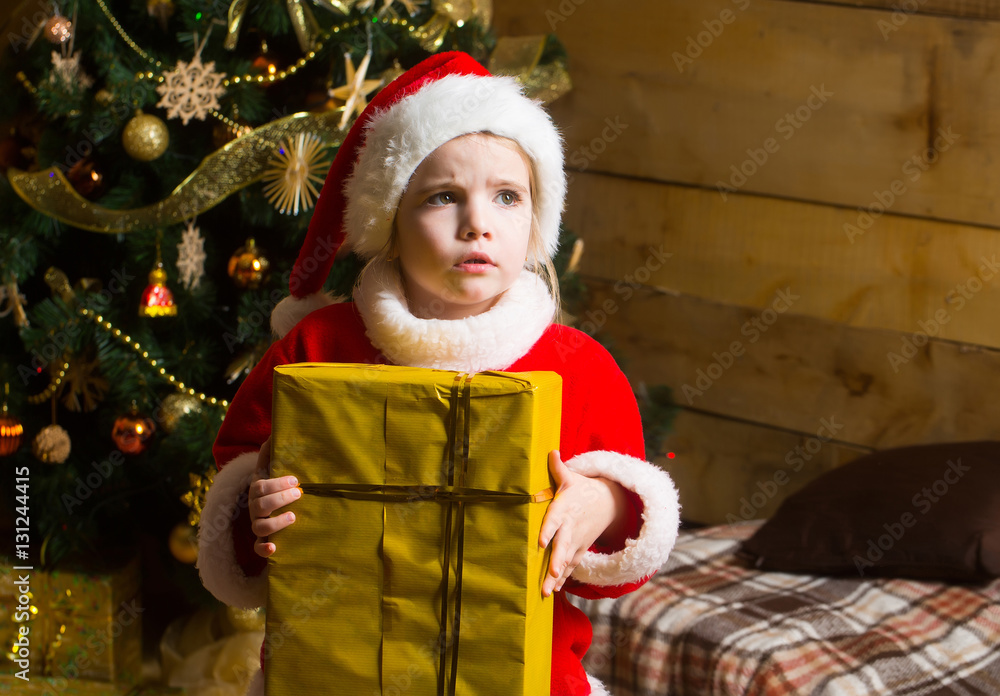 christmas serious girl with present box