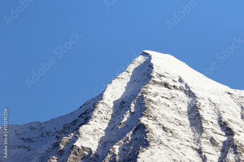 Snow covered Mount Vogorno, Ticino, Switzerland photo