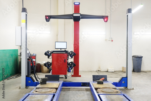 Wheel alignment equipment in a car repair station