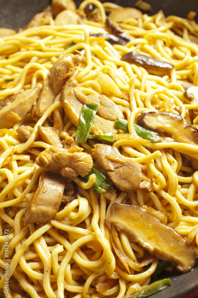 Hong Kong Style Chicken Lo Mein in a wok Hong Kong Style Chicken Lo Mein in a wok