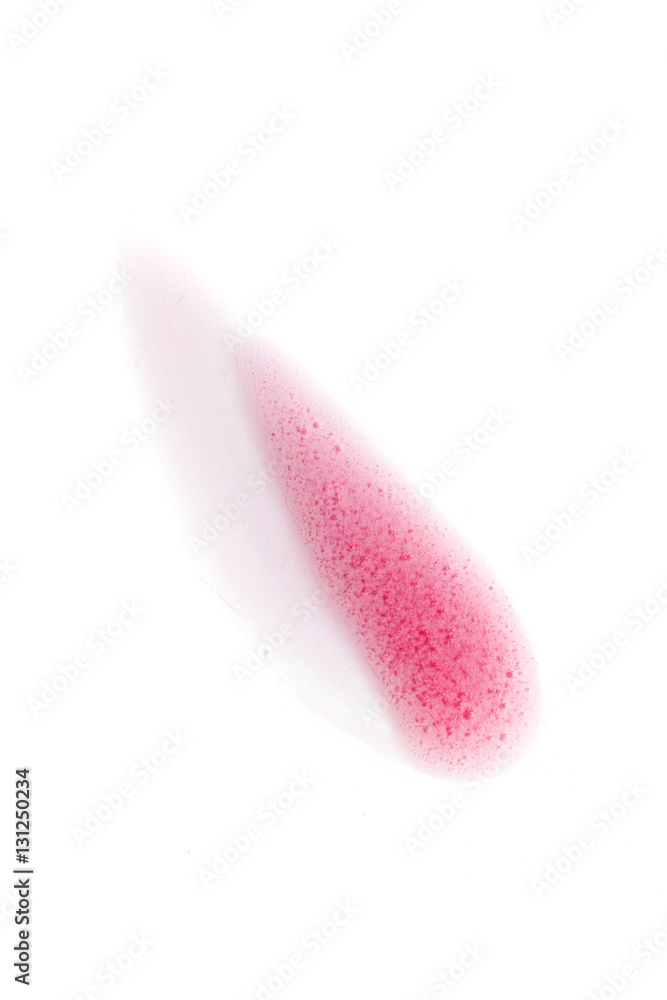 Pink color lip gloss paint drop on background Pink color lip gloss paint drop on background