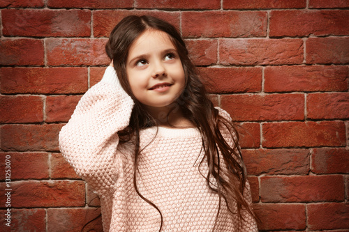 Cute little girl in warm sw...