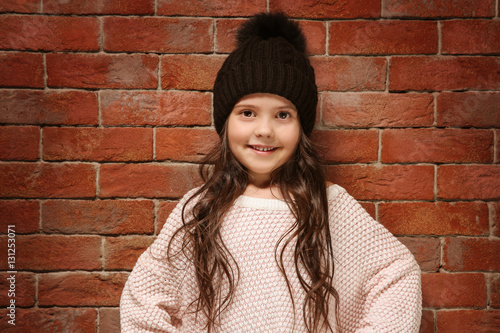 Cute little girl in warm cl...