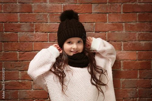 Cute little girl in warm cl...