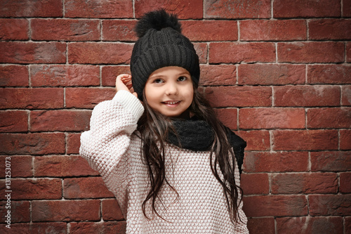 Cute little girl in warm cl...