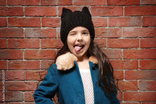 Cute little girl in warm cl...