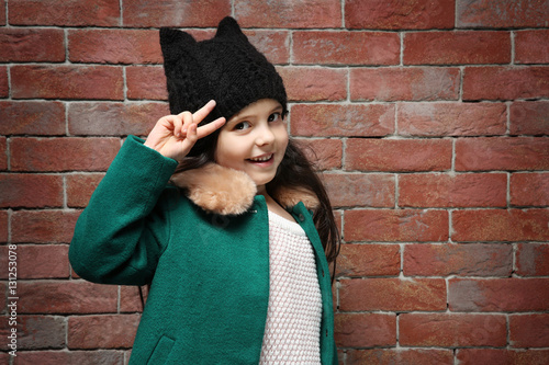 Cute little girl in warm cl...
