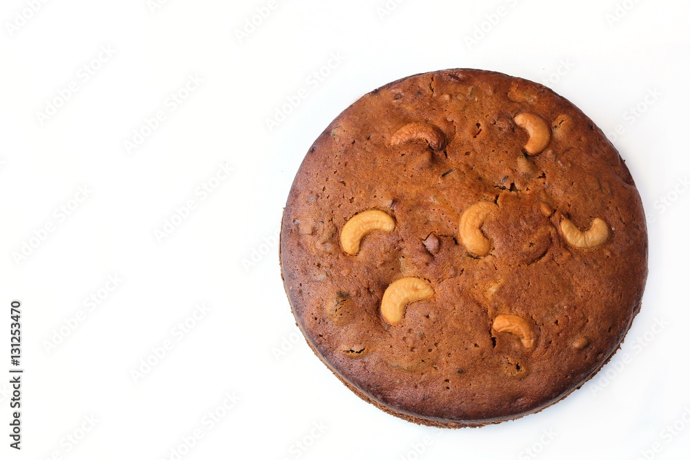 Christmas fruit cake isolated on white, top down view Christmas fruit cake isolated on white, top down view