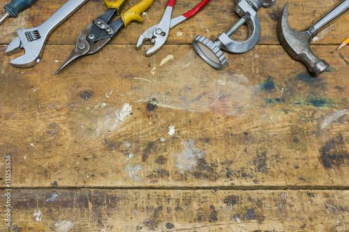Wallpaper Mural Workshop background, used wooden bench with tools along top bord Torontodigital.ca