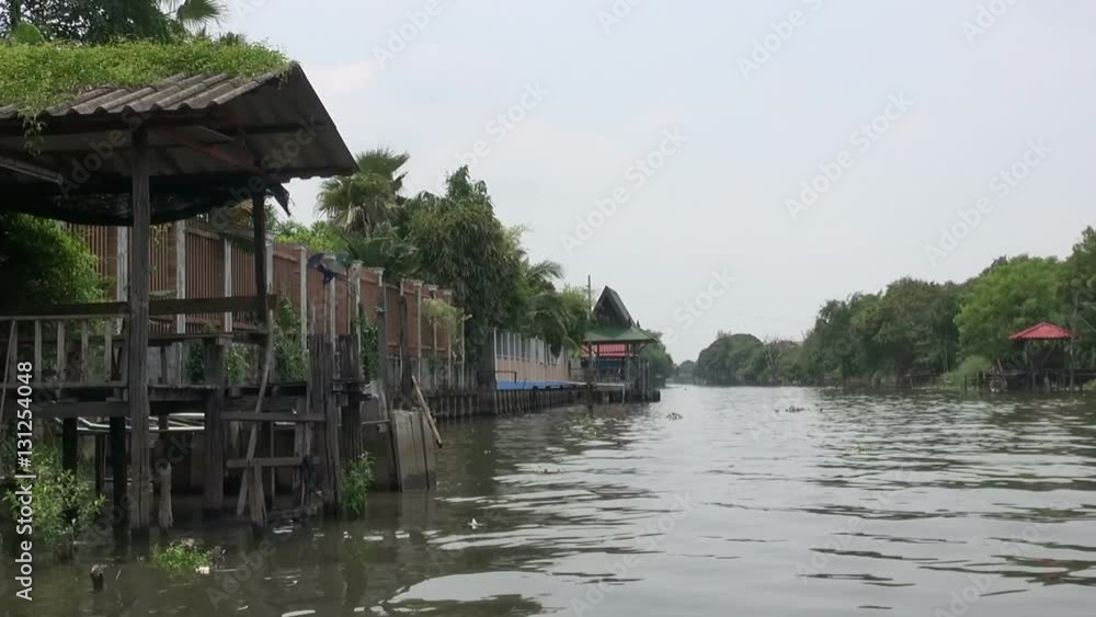 Pagoda On An Asian River Bank. Swing past a ramshackle wooden jetty/pagoda on the banks of an Asian river. Pagoda On An Asian River Bank. Swing past a ramshackle wooden jetty/pagoda on the banks of an Asian river.