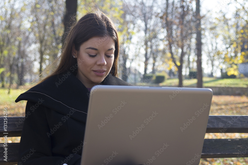 Young business woman with the laptop Young business woman with the laptop