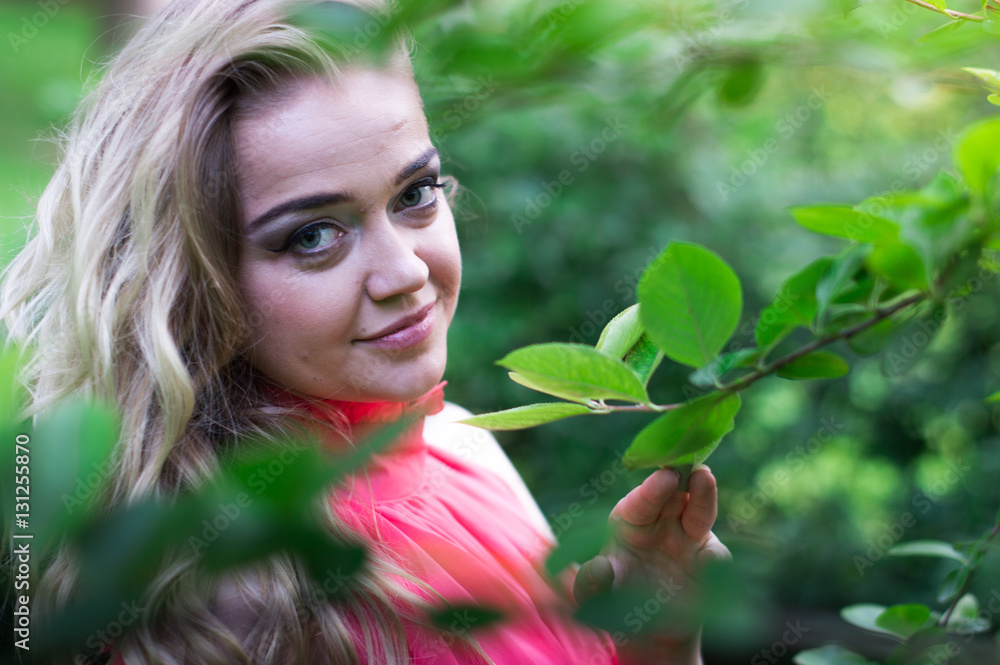 beautiful girl with blonde long hair in the Park beautiful girl with blonde long hair in the Park