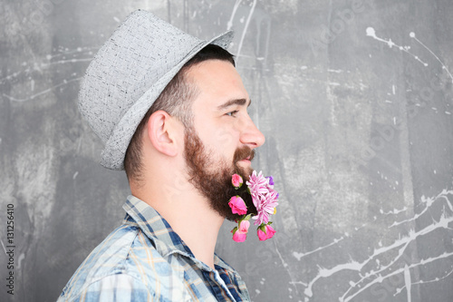 Handsome man in hat with be...
