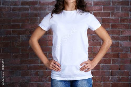 Young woman in blank white ...