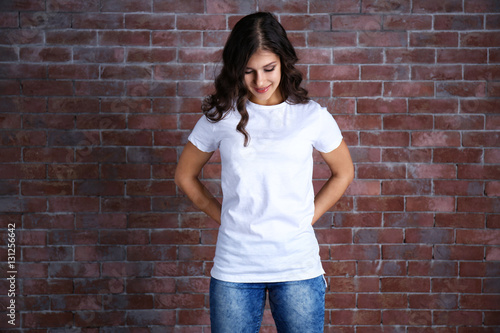 Young woman in blank white ...