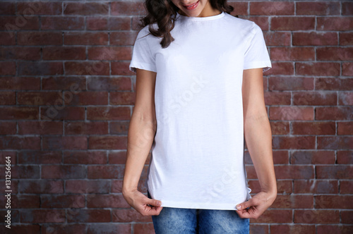 Young woman in blank white ...