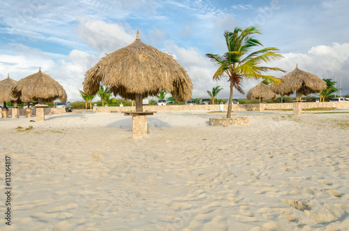 Rest area with Palm trees by the beach in Aruba © vbjunior