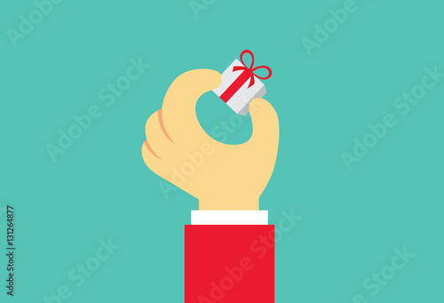 Hand holding small gift box with fingers. Illustration about special day of people.