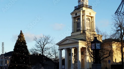 Christmas market and winter tree in the center of Ventspils, in winter season photo