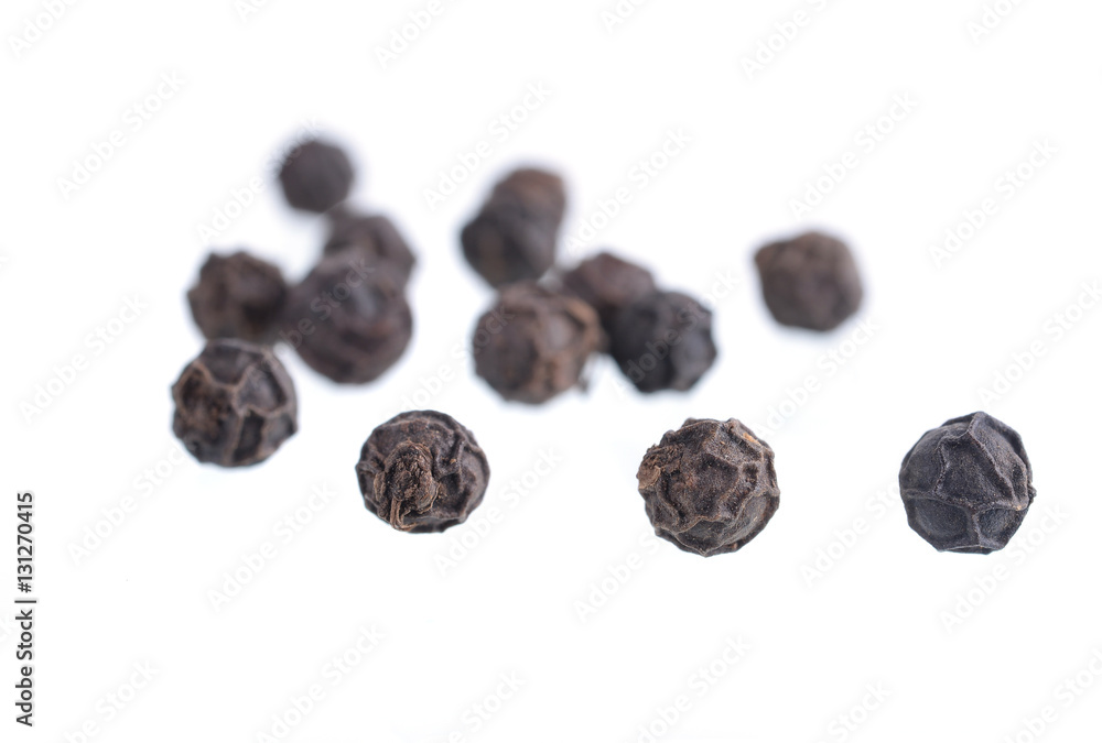 Obraz premium Black pepper was placed on a white background