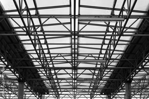 The design of the roof ceiling of the metal space frame and glass filling. Symmetric perspective view.