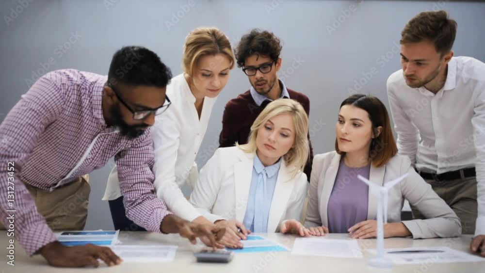 business team discussing green energy project