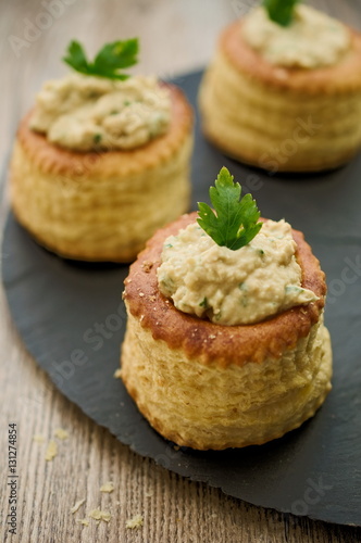 Puff pastry bouchees filled tuna spread parsley