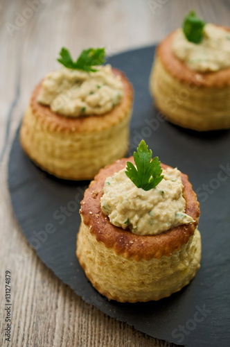 Puff pastry bouchees filled tuna spread parsley