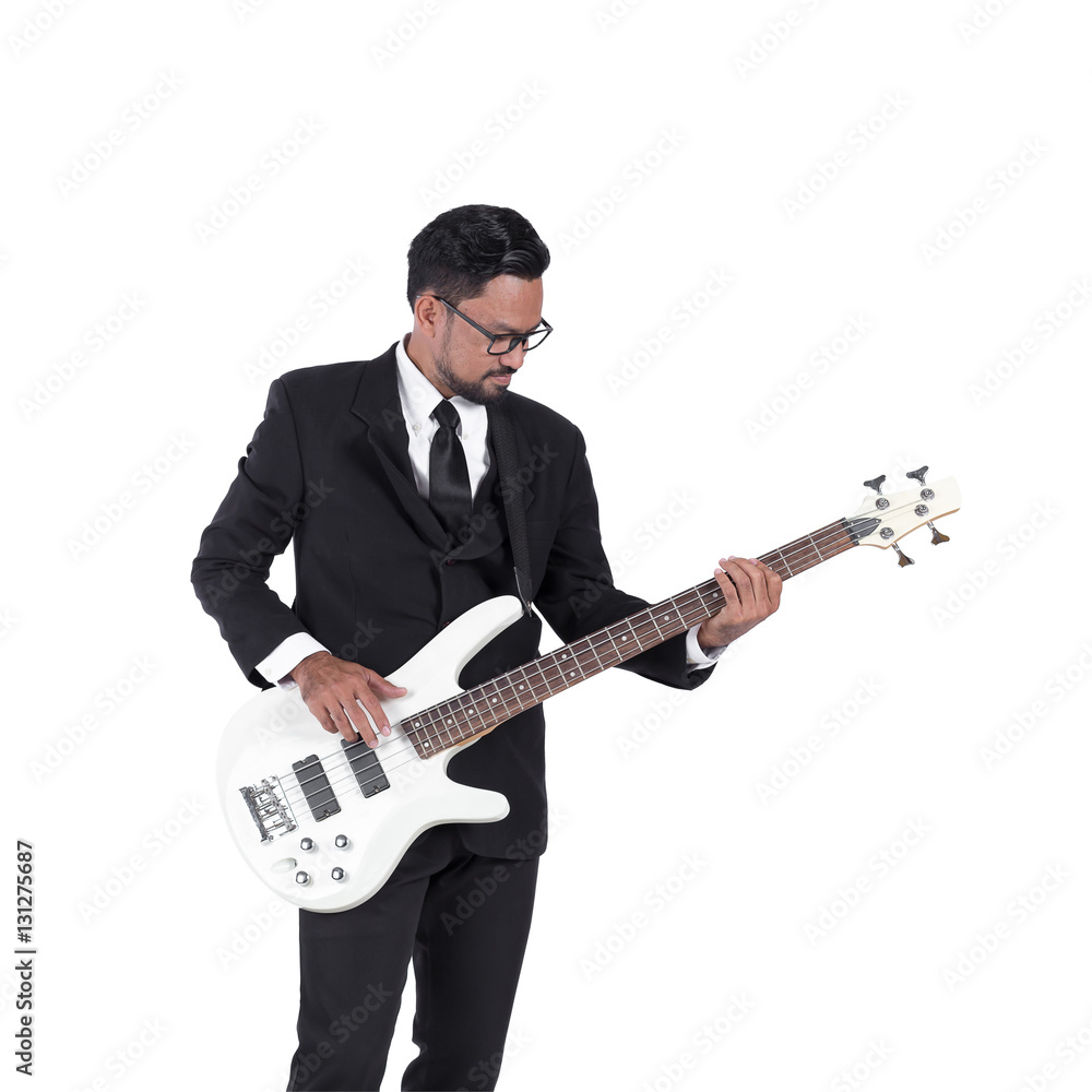 Business man playing bass guitar on white background. Stock Photo