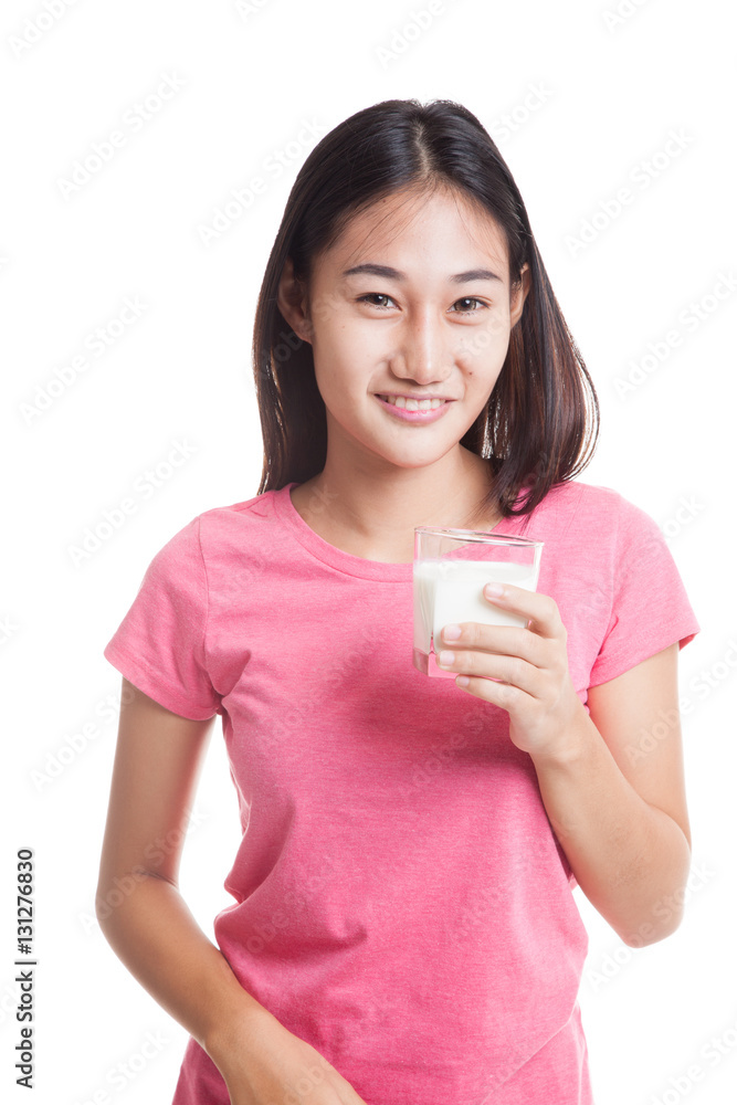 Healthy Asian woman drinking a glass of milk. Healthy Asian woman drinking a glass of milk.
